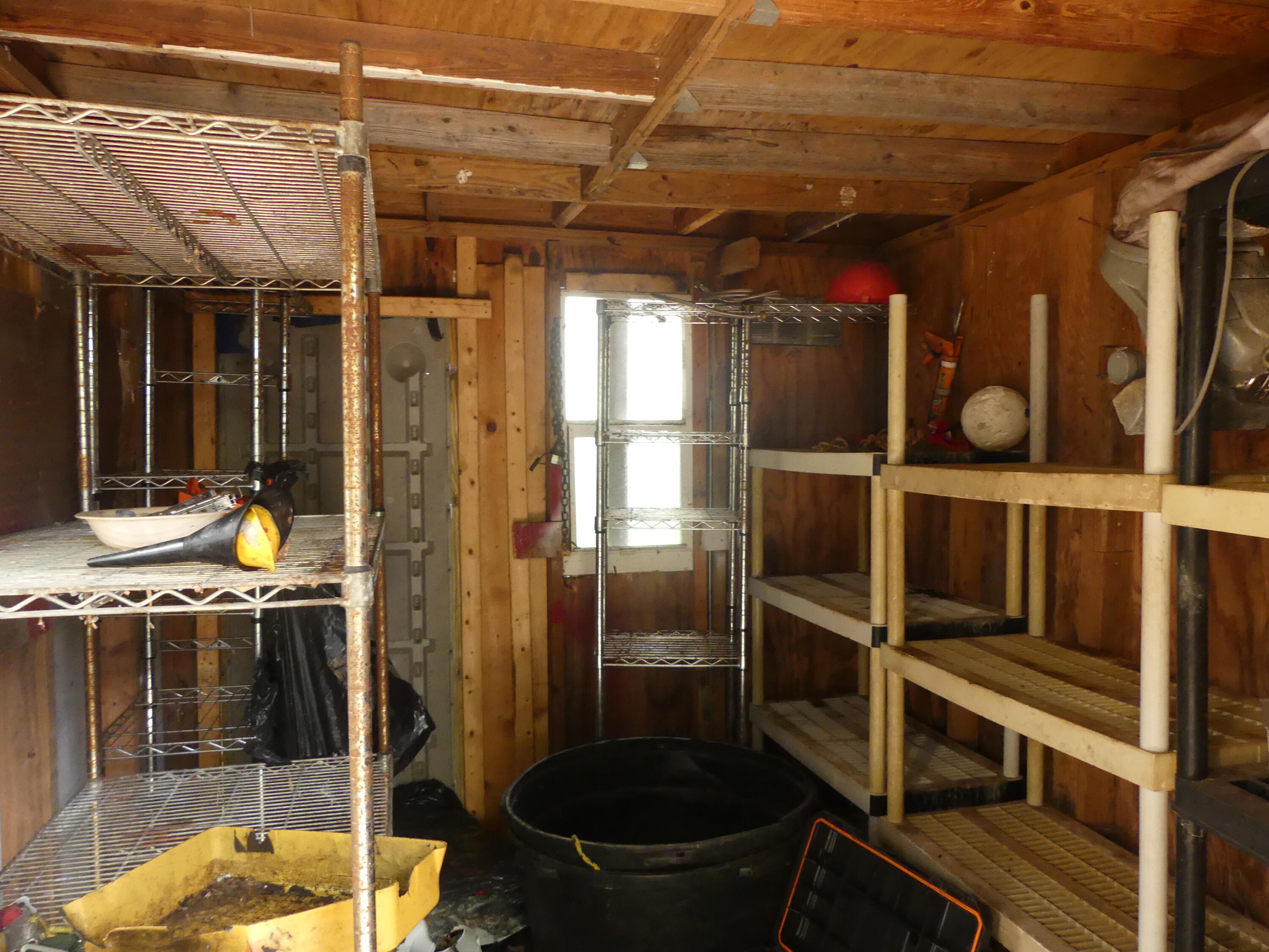 6633 Rigger Road Lake Worth, FL 33462 - Photo 24 of 28 a view of storage and utility room