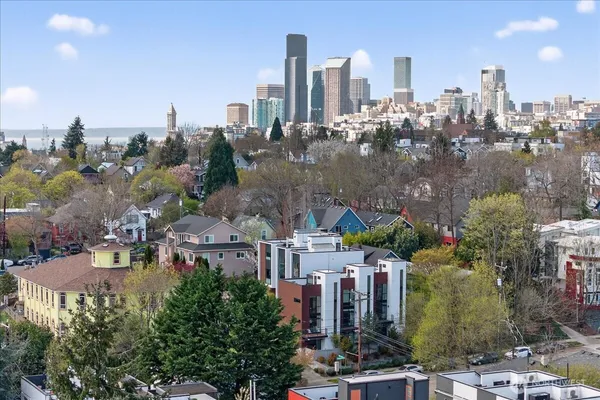 a view of a city with tall buildings