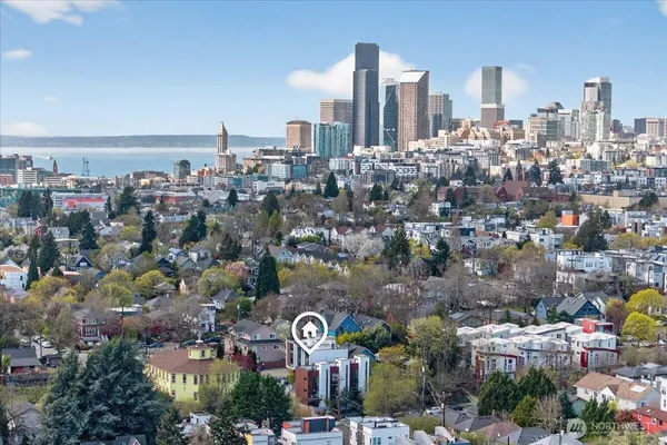 a view of a city with tall buildings