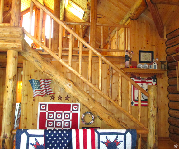 6210 Mountain View Road, Unit 133 Coalville, UT 84017 - Photo 24 of 87 View of the log staircase to the loft, with log railings.