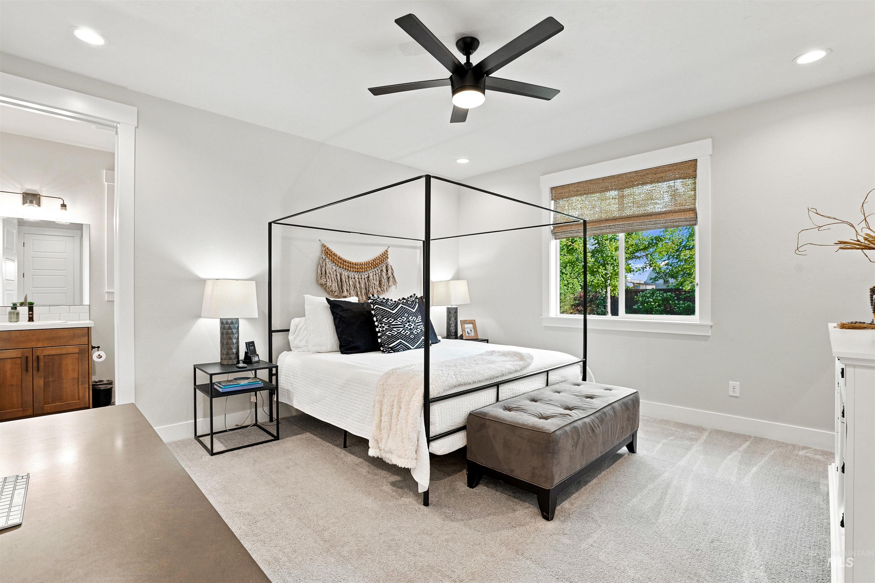 4323 West Ladle Rpds Drive Meridian, ID 83646 - Photo 28 of 49 Light-filled room featuring a broad window, recessed lighting, and a dark-toned ceiling fan