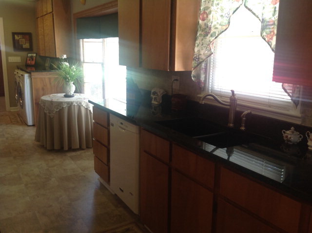 1868 Upper River Road Macon, GA 31211 - Photo 14 of 33 a kitchen with a sink cabinets and a window