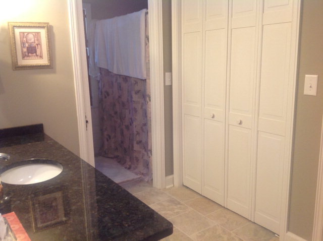1868 Upper River Road Macon, GA 31211 - Photo 21 of 33 a bathroom with a sink and a mirror