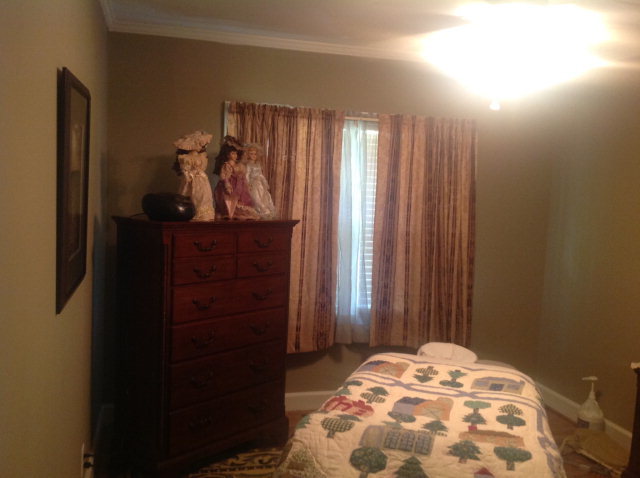 1868 Upper River Road Macon, GA 31211 - Photo 24 of 33 a bedroom with a bed and a dresser