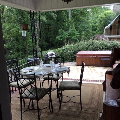 1868 Upper River Road Macon, GA 31211 - Photo 26 of 33 a view of a patio with table and chairs with wooden floor and fence