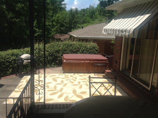 1868 Upper River Road Macon, GA 31211 - Photo 27 of 33 a patio with table and chairs and potted plants