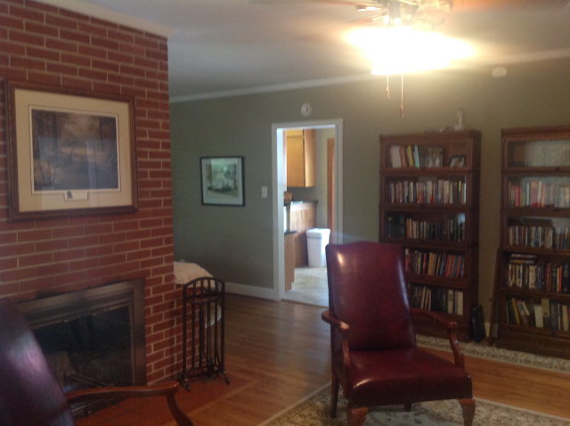 1868 Upper River Road Macon, GA 31211 - Photo 7 of 33 a living room with furniture a bookshelf and a window