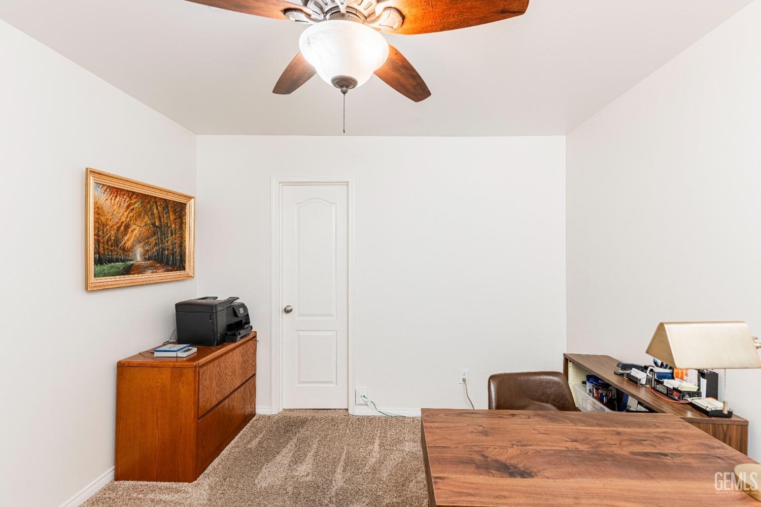 Undisclosed Address Bakersfield, CA 93312 - Photo 19 of 51 a bedroom with a bed and a chandelier