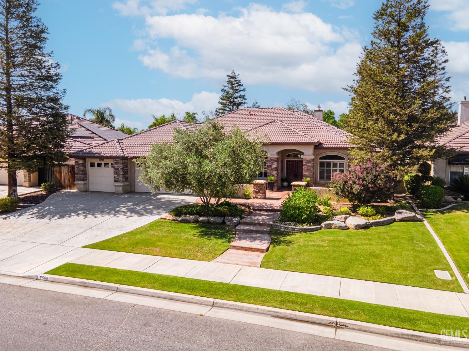 Undisclosed Address Bakersfield, CA 93312 - Photo 2 of 51 a view of a house with swimming pool and sitting area