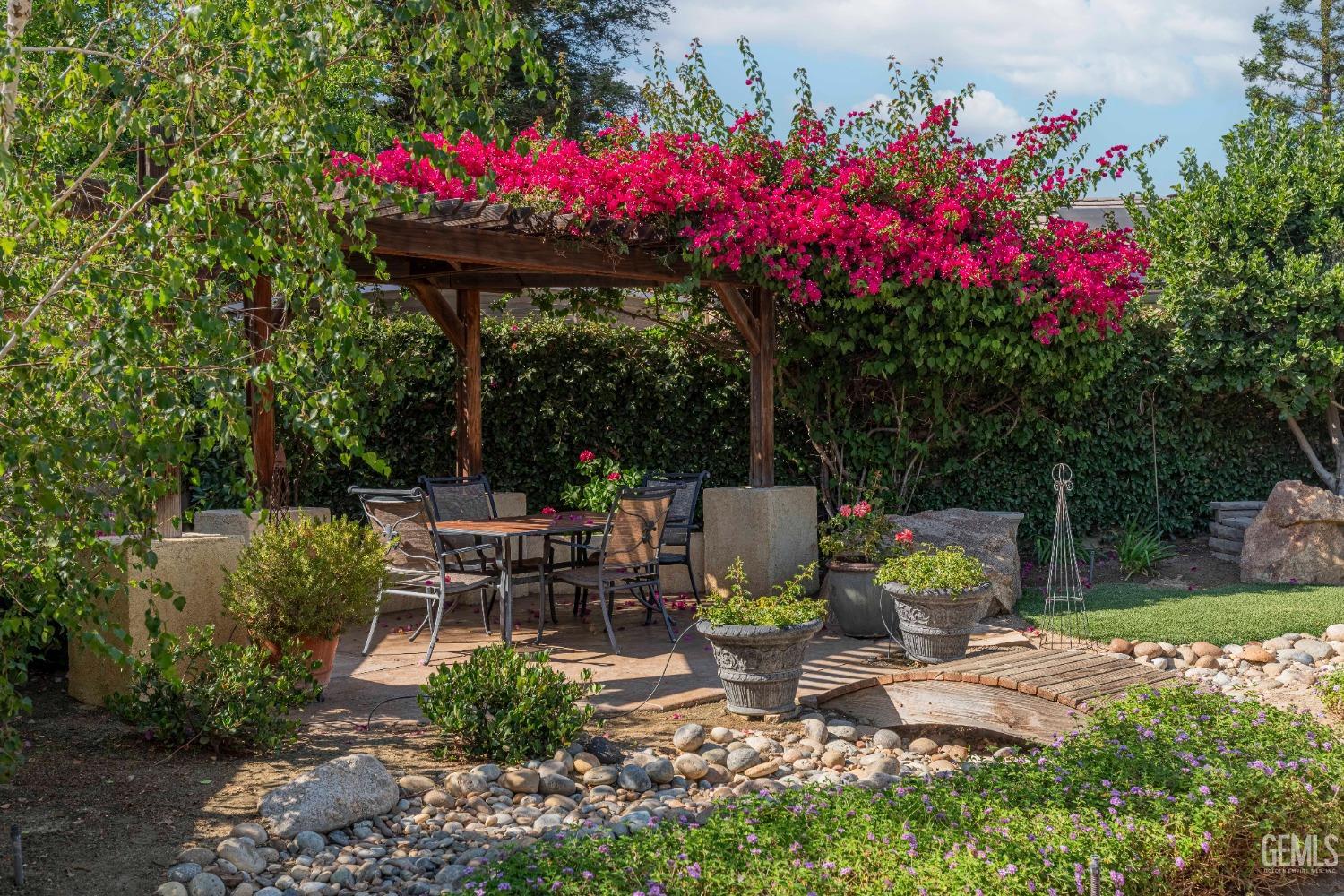 Undisclosed Address Bakersfield, CA 93312 - Photo 44 of 51 a view of a table and chairs in patio