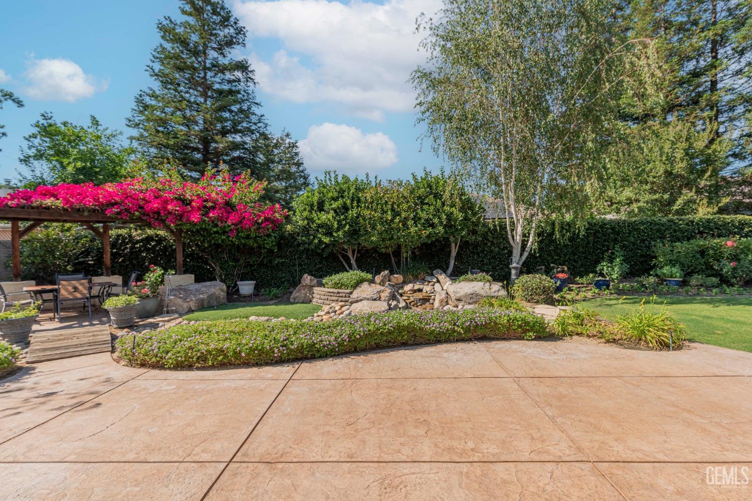 Undisclosed Address Bakersfield, CA 93312 - Photo 47 of 51 a view of backyard with seating and green space