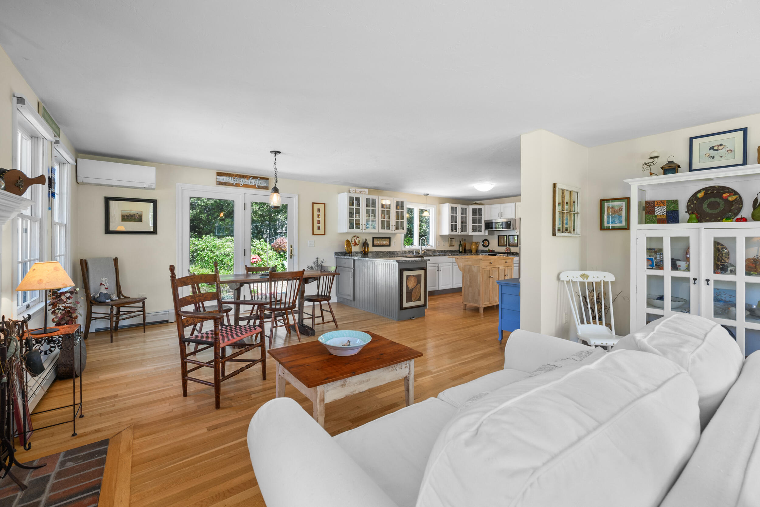 19 Burning Bush Way Brewster, MA 02631 - Photo 54 of 54 a living room with furniture wooden floor and a large window