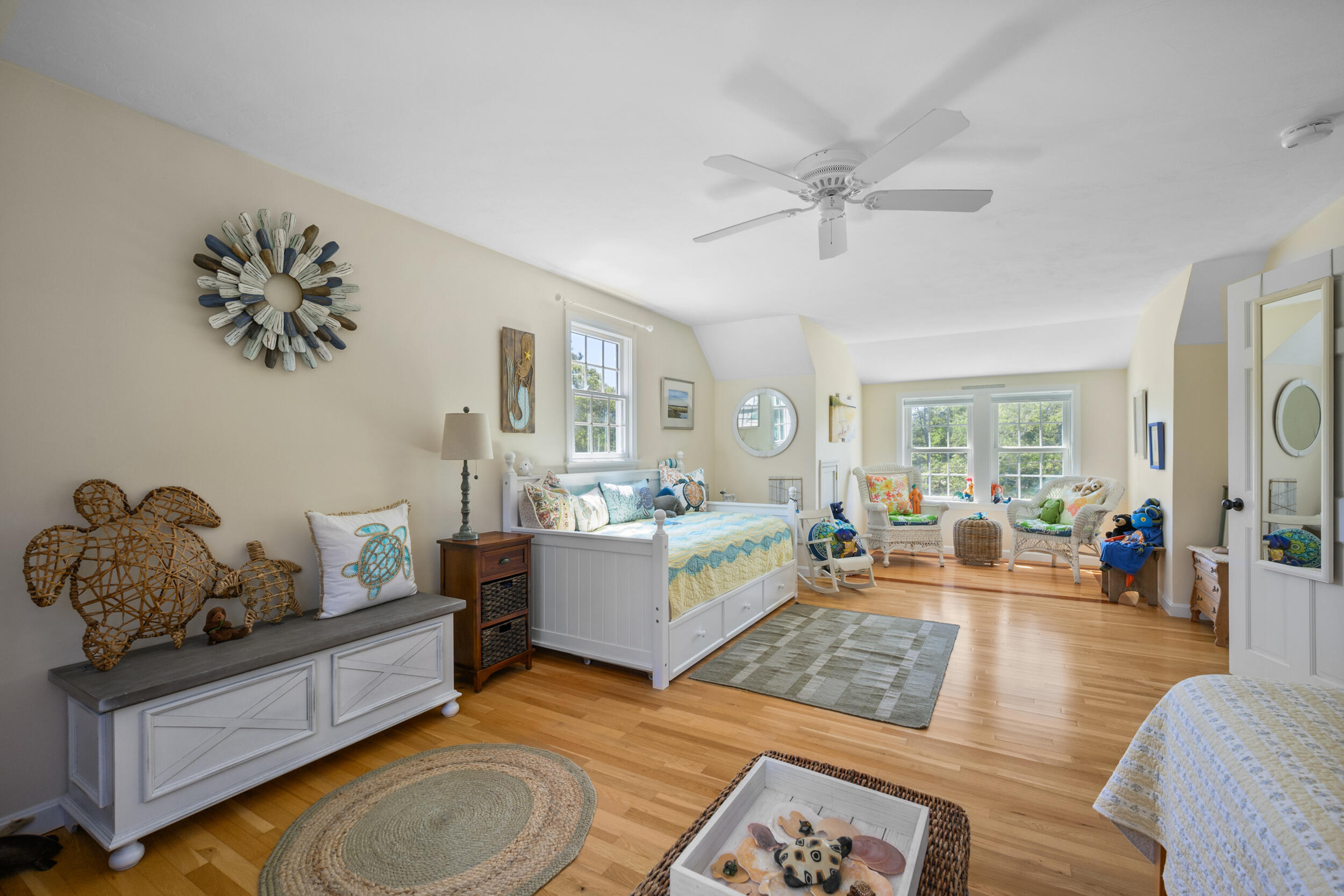 19 Burning Bush Way Brewster, MA 02631 - Photo 28 of 54 a living room with furniture and a large window