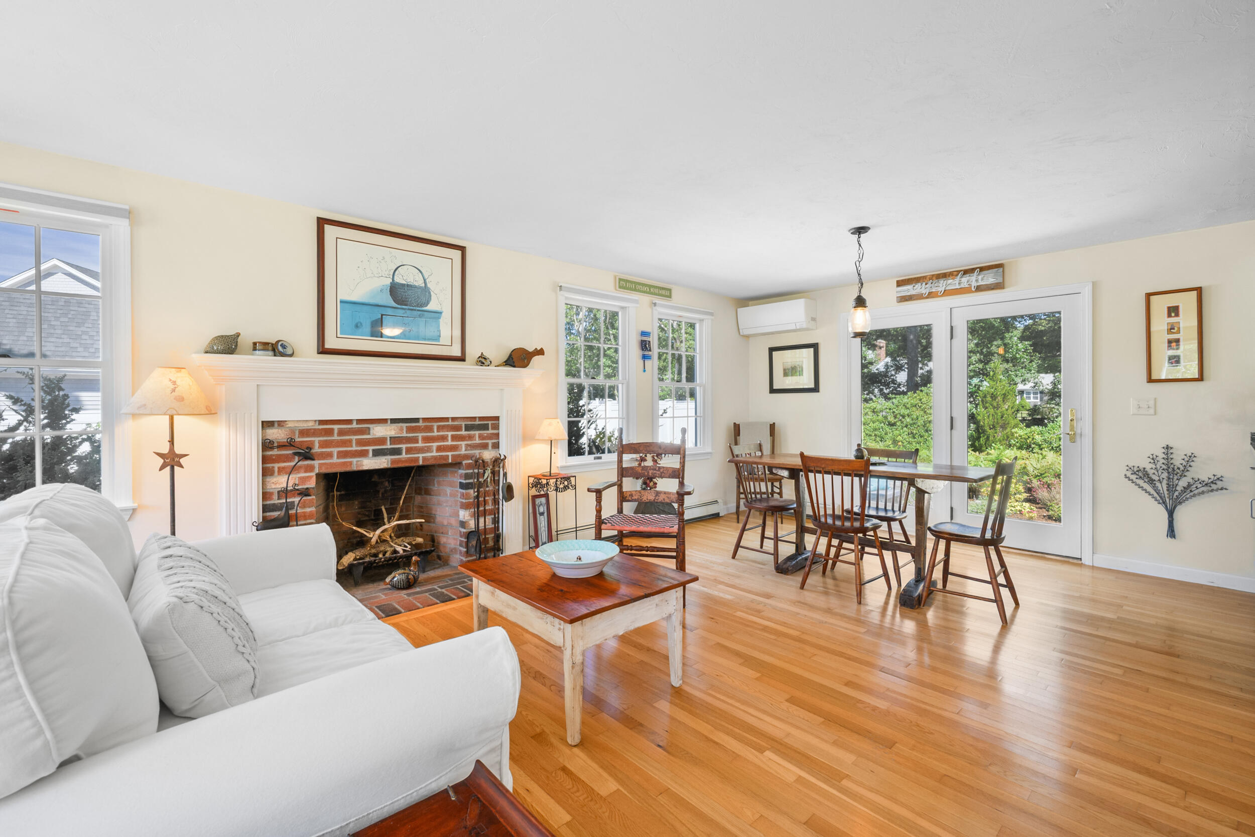 19 Burning Bush Way Brewster, MA 02631 - Photo 2 of 54 a living room with furniture wooden floor and a fireplace
