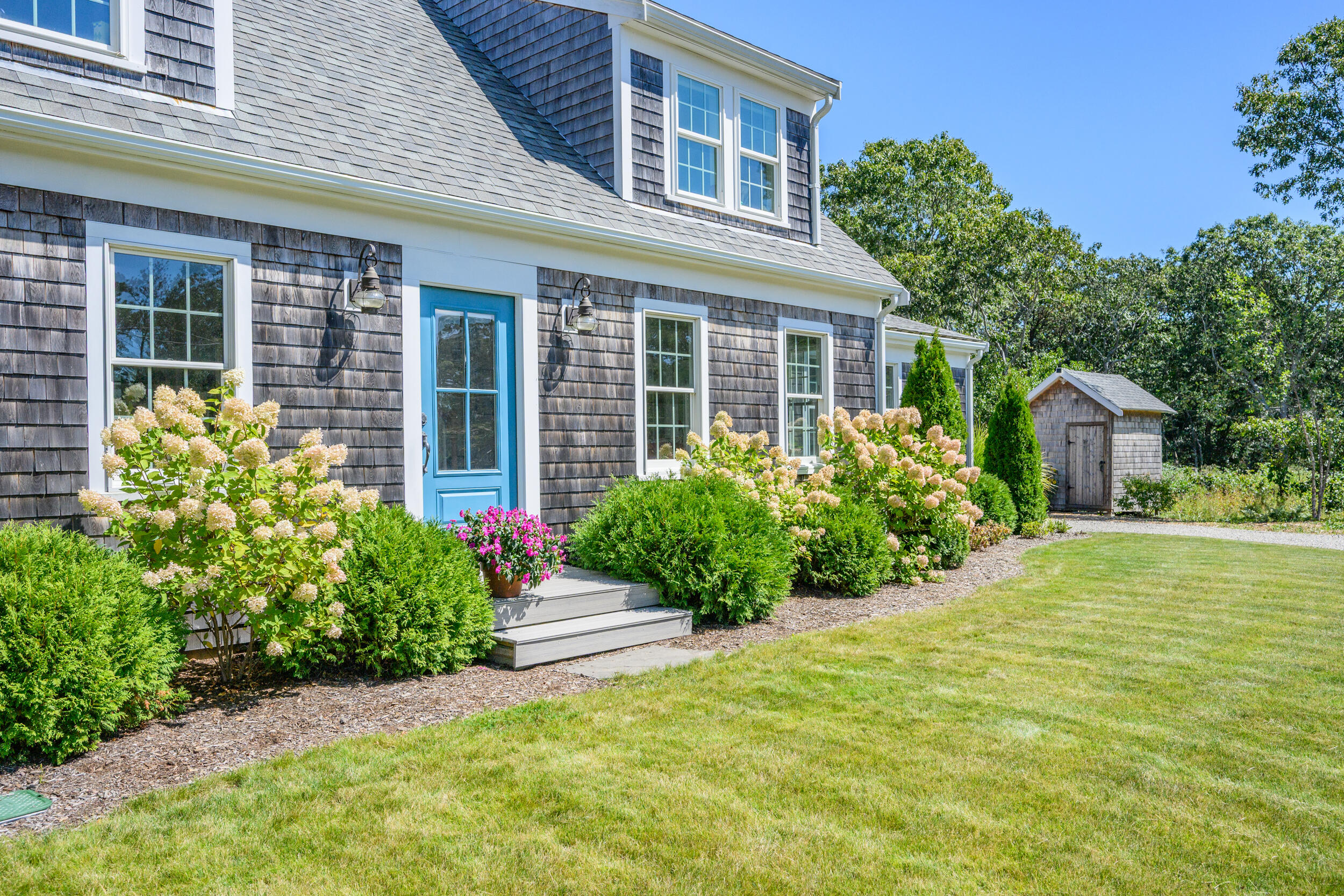 19 Burning Bush Way Brewster, MA 02631 - Photo 38 of 54 Front door and shed