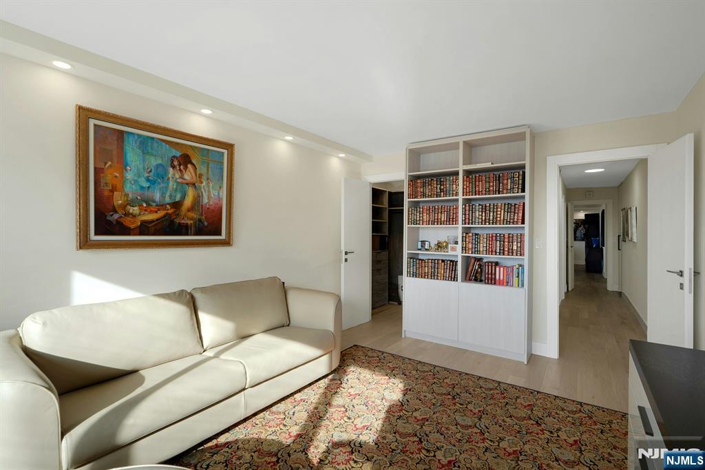 6 Horizon Road, Unit 2602 Fort Lee, NJ 07024 - Photo 25 of 45 a living room with furniture and a rug
