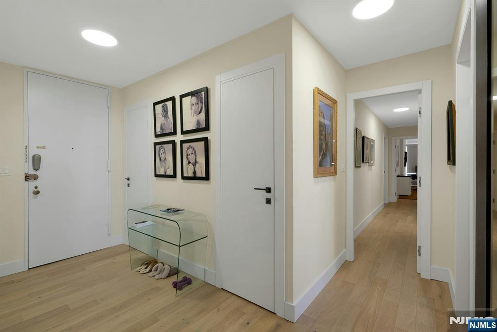 6 Horizon Road, Unit 2602 Fort Lee, NJ 07024 - Photo 4 of 45 a view of a hallway with workspace