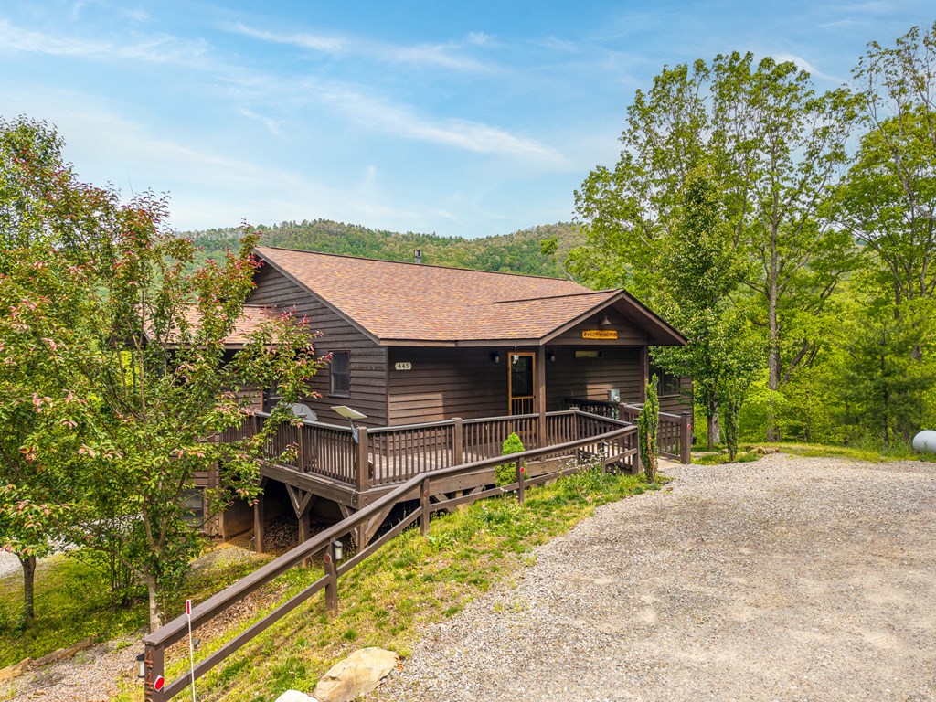 445 Tranquil Cove Road Murphy, NC 28906 - Photo 13 of 91 a front view of a house with a garden