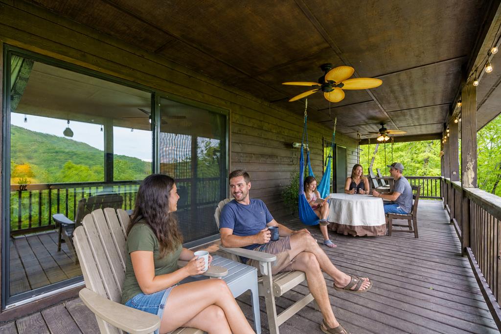 445 Tranquil Cove Road Murphy, NC 28906 - Photo 15 of 91 a view of a patio with a table chairs and a patio