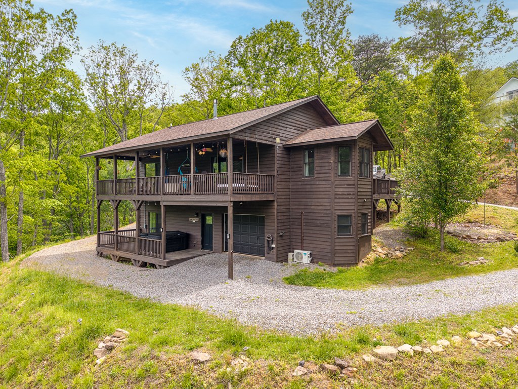 445 Tranquil Cove Road Murphy, NC 28906 - Photo 18 of 91 a view of a house with a patio and a yard