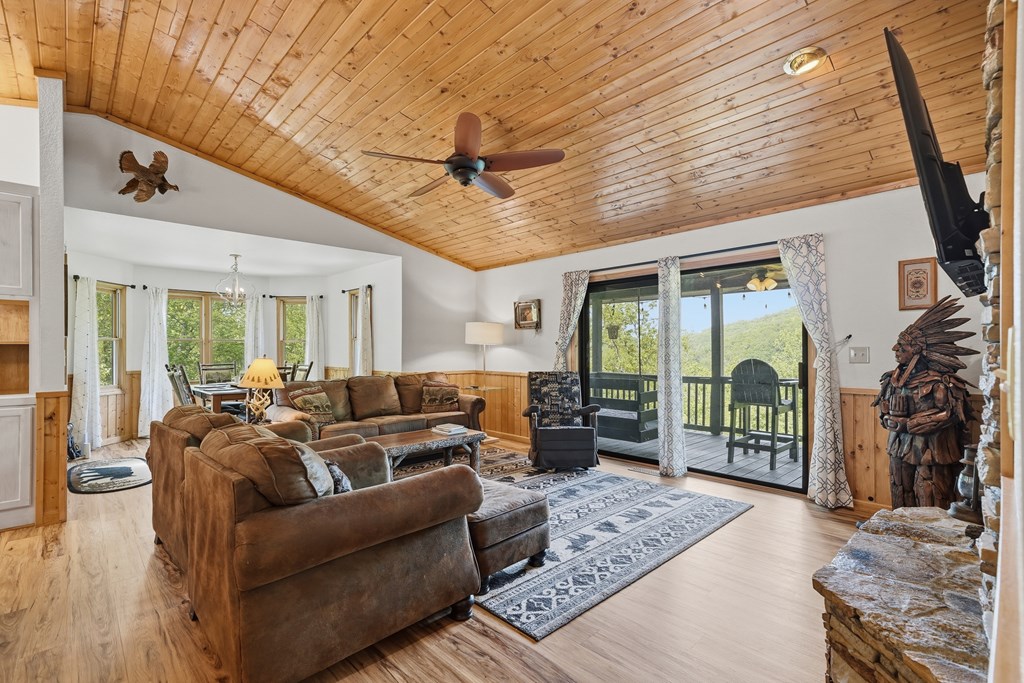 445 Tranquil Cove Road Murphy, NC 28906 - Photo 35 of 91 a living room with furniture and a flat screen tv