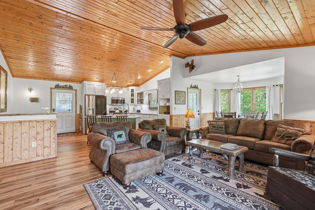 445 Tranquil Cove Road Murphy, NC 28906 - Photo 39 of 91 a living room with furniture and wooden floor