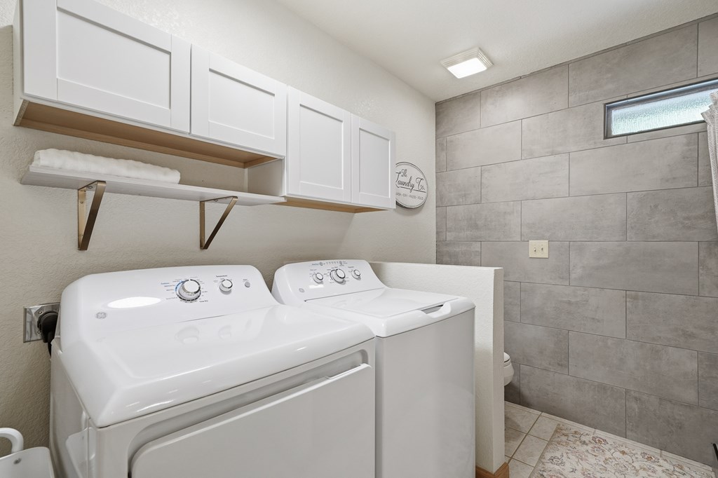 445 Tranquil Cove Road Murphy, NC 28906 - Photo 48 of 91 a utility room with dryer and washer