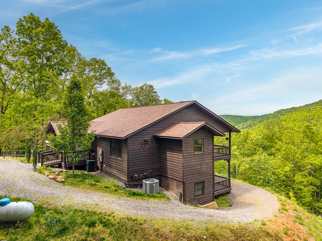 445 Tranquil Cove Road Murphy, NC 28906 - Photo 5 of 91 a front view of a house with a yard