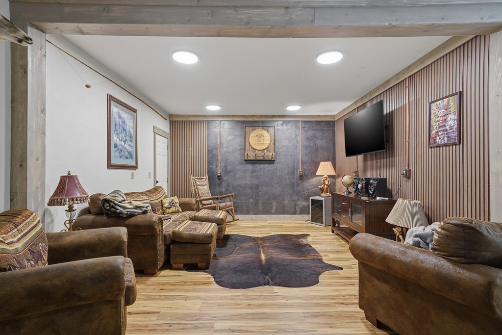 445 Tranquil Cove Road Murphy, NC 28906 - Photo 74 of 91 a living room with furniture and a flat screen tv