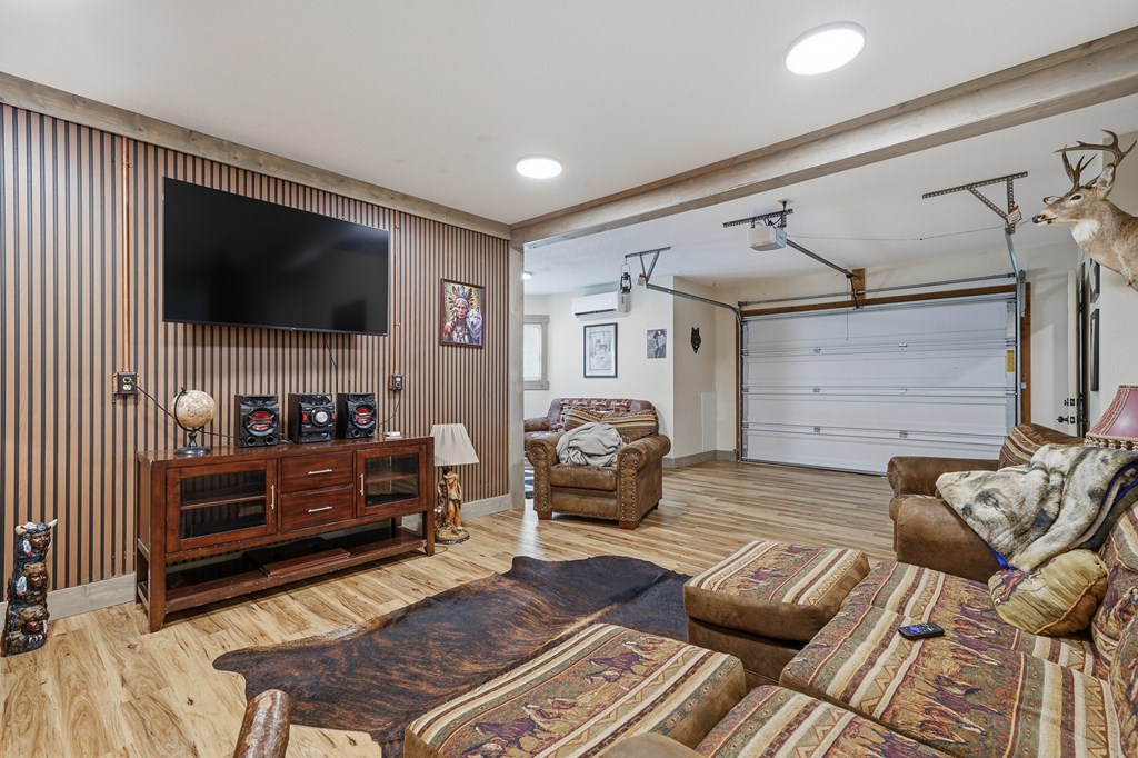445 Tranquil Cove Road Murphy, NC 28906 - Photo 75 of 91 a living room with furniture and a flat screen tv
