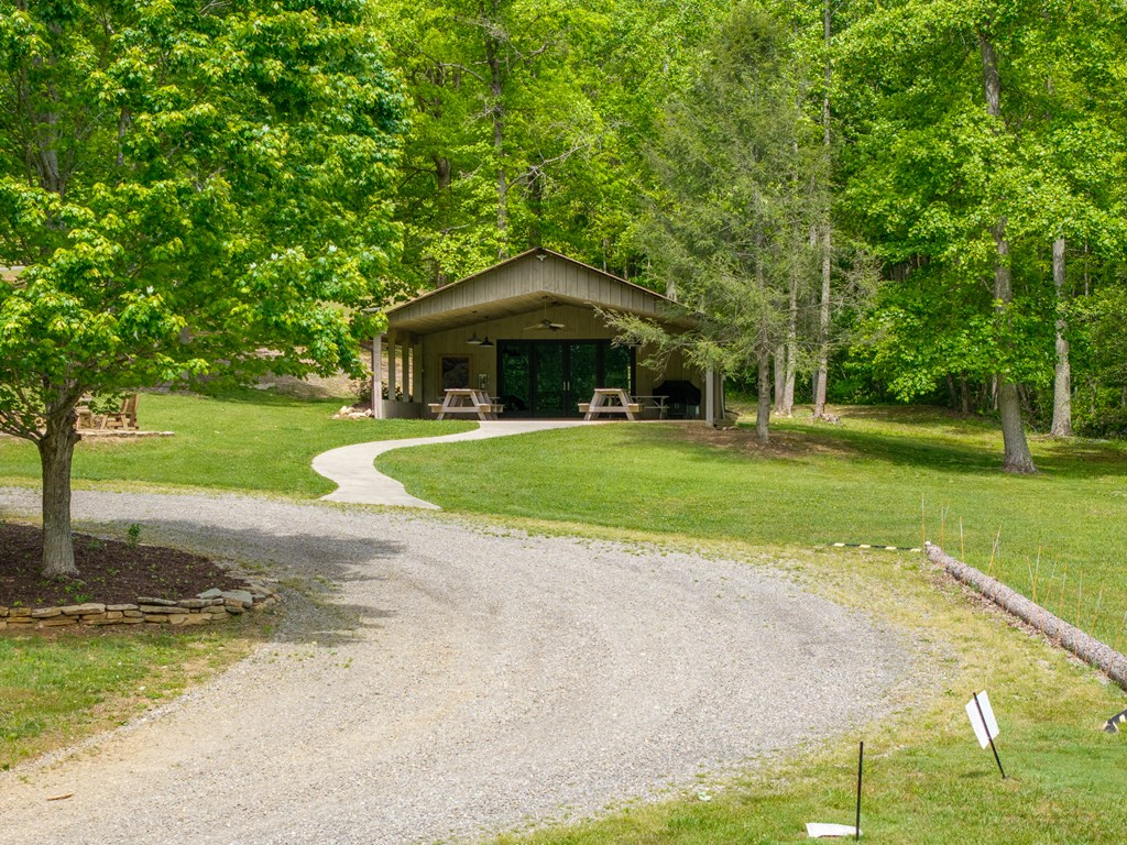 445 Tranquil Cove Road Murphy, NC 28906 - Photo 88 of 91 a front view of a house with a yard