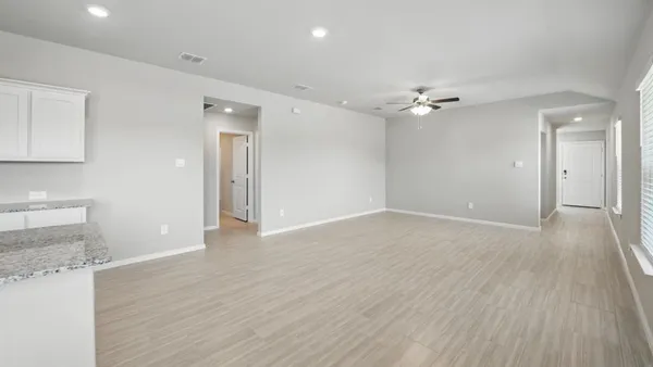 a view of kitchen with wooden floor