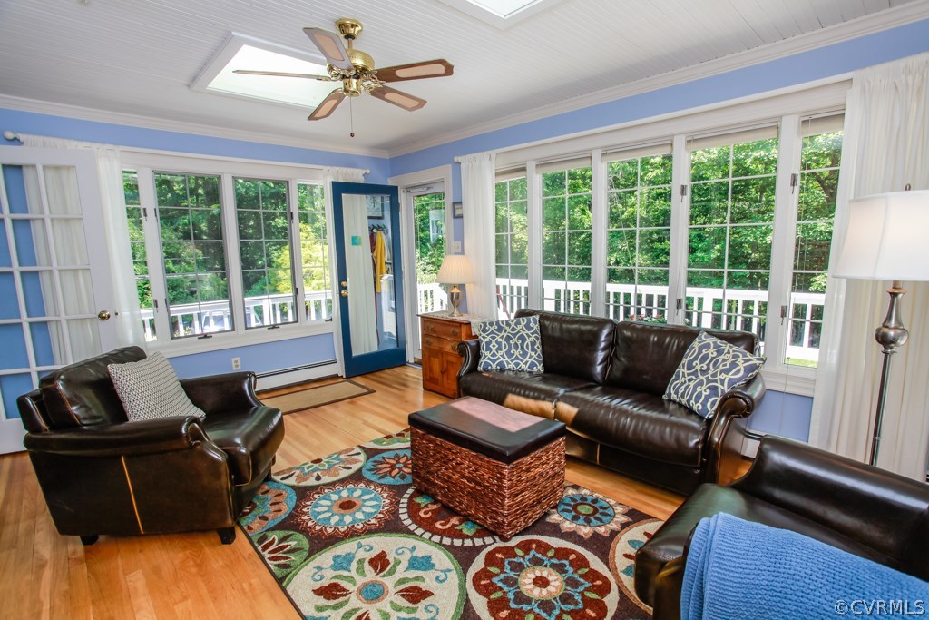 3641 Old Gun Road Midlothian, VA 23113 - Photo 11 of 24 a living room with furniture and floor to ceiling windows