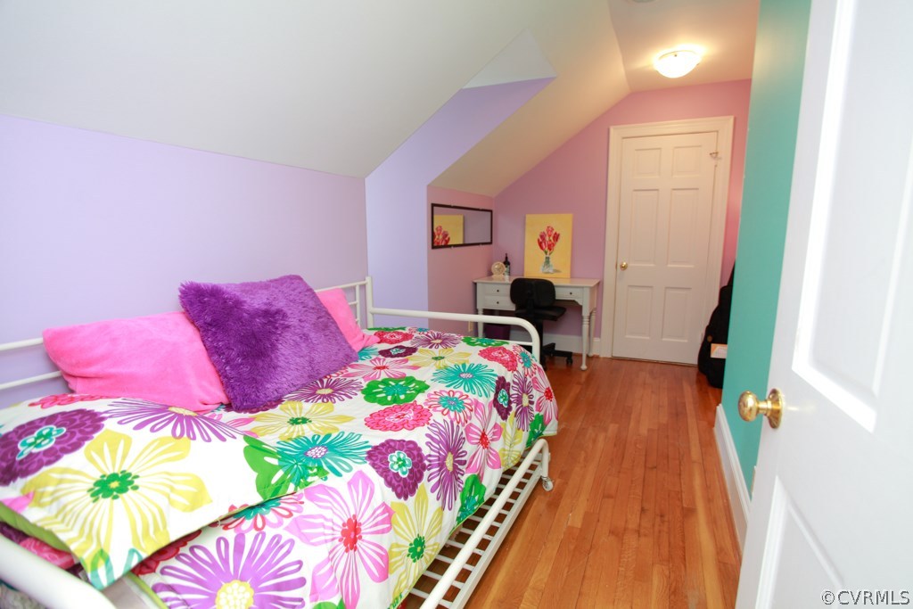3641 Old Gun Road Midlothian, VA 23113 - Photo 20 of 24 a bedroom with a bed and a lamp