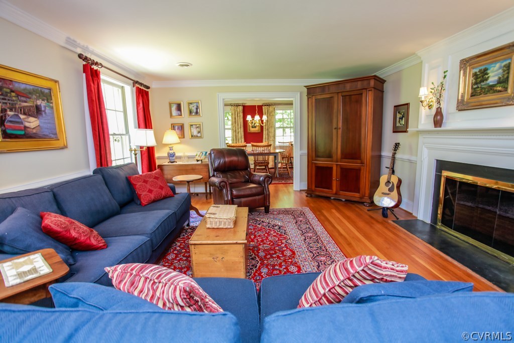 3641 Old Gun Road Midlothian, VA 23113 - Photo 5 of 24 a living room with furniture fireplace and wooden floor