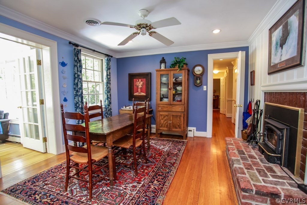 3641 Old Gun Road Midlothian, VA 23113 - Photo 9 of 24 a view of a livingroom with furniture window and wooden floor