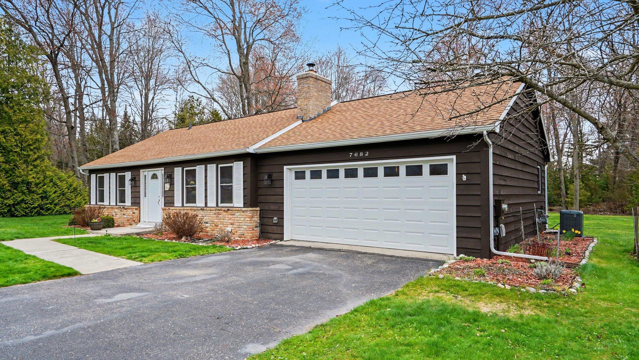 7682 Woodlea Road West Oscoda, MI 48750 - Photo 4 of 26