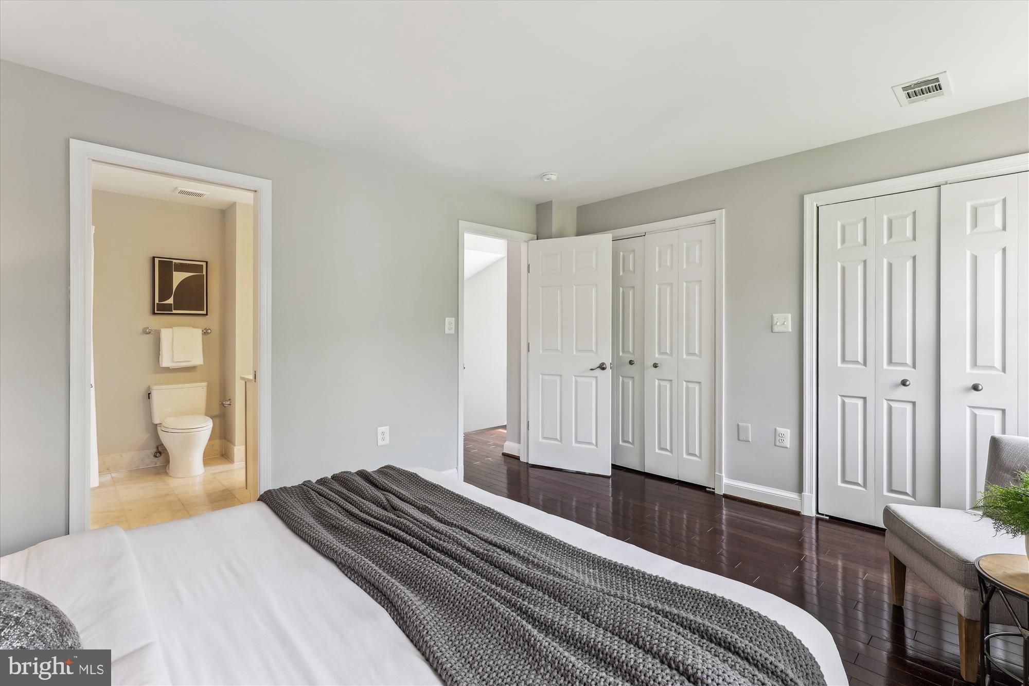 1406 Foxhall Road Northwest Washington, DC 20007 - Photo 12 of 41 a bedroom with a bed and a closet