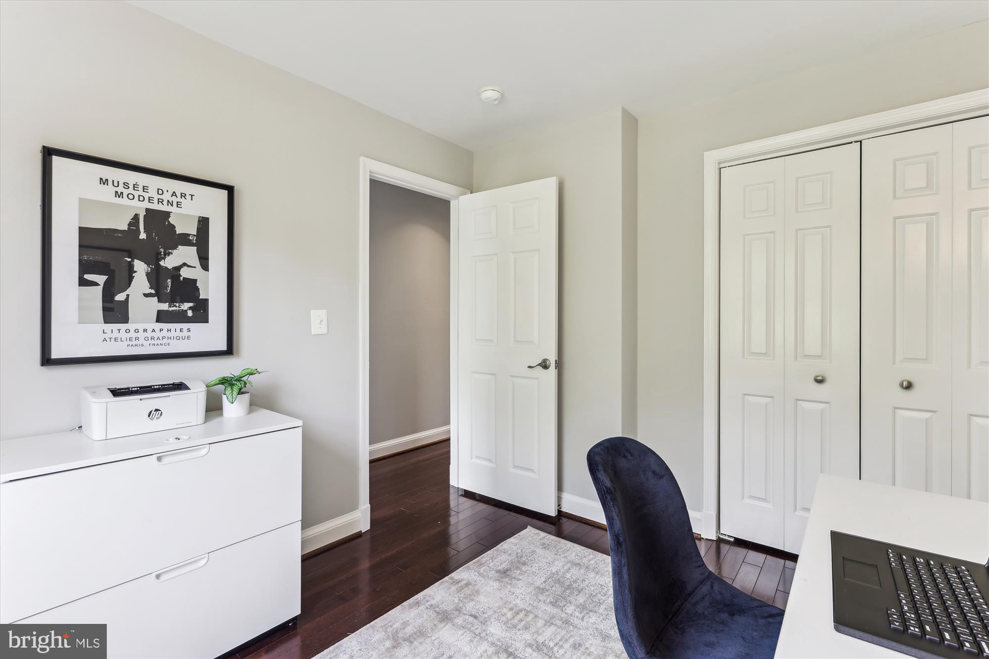1406 Foxhall Road Northwest Washington, DC 20007 - Photo 16 of 41 a bedroom with furniture and a window