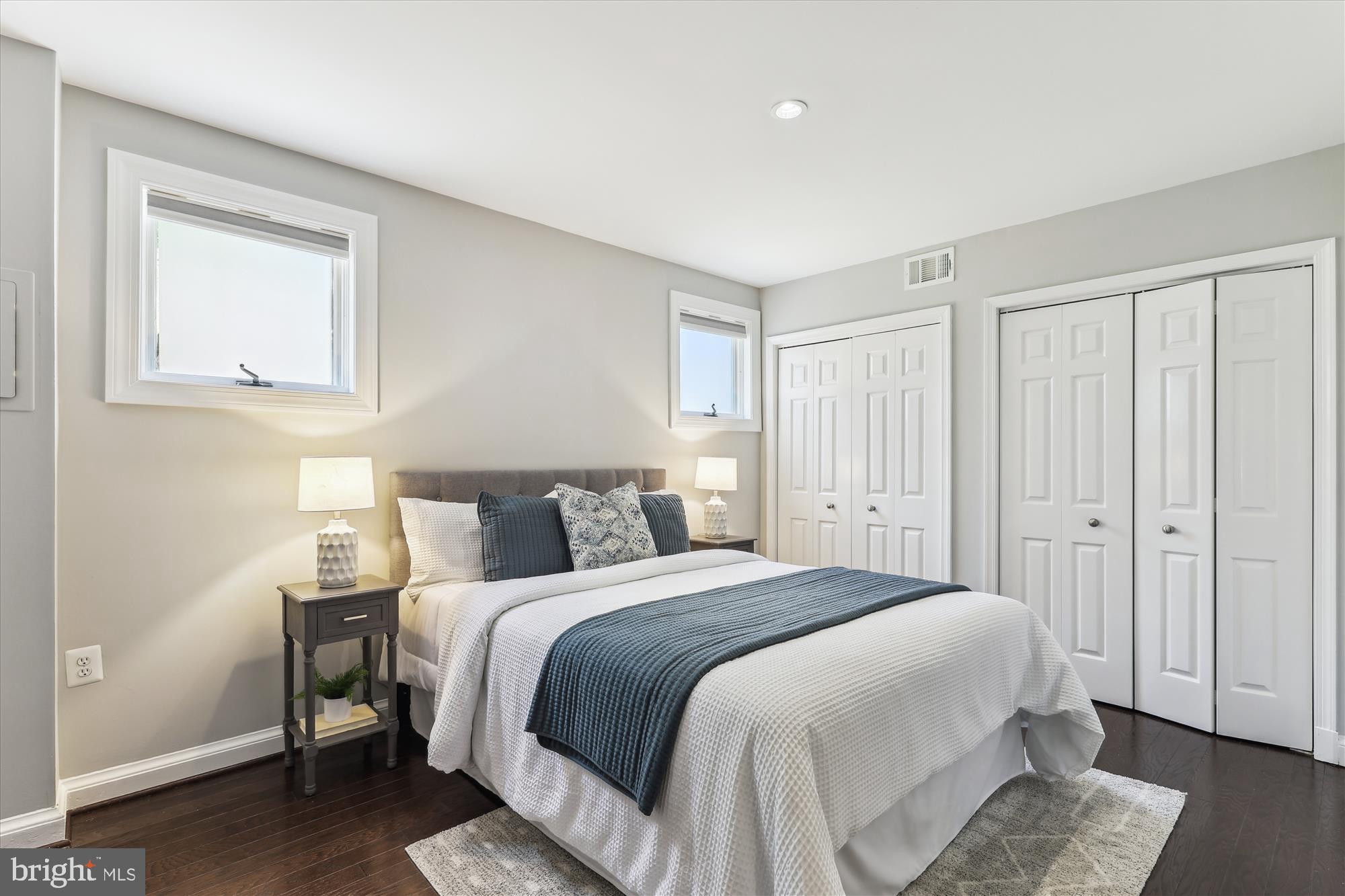 1406 Foxhall Road Northwest Washington, DC 20007 - Photo 23 of 41 a bedroom with a bed and a window