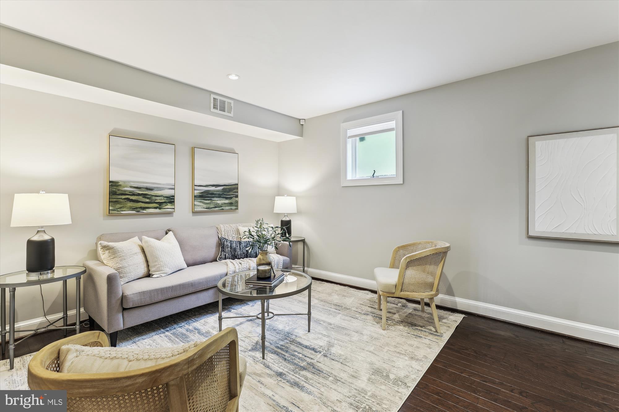 1406 Foxhall Road Northwest Washington, DC 20007 - Photo 26 of 41 a living room with furniture and a wooden floor