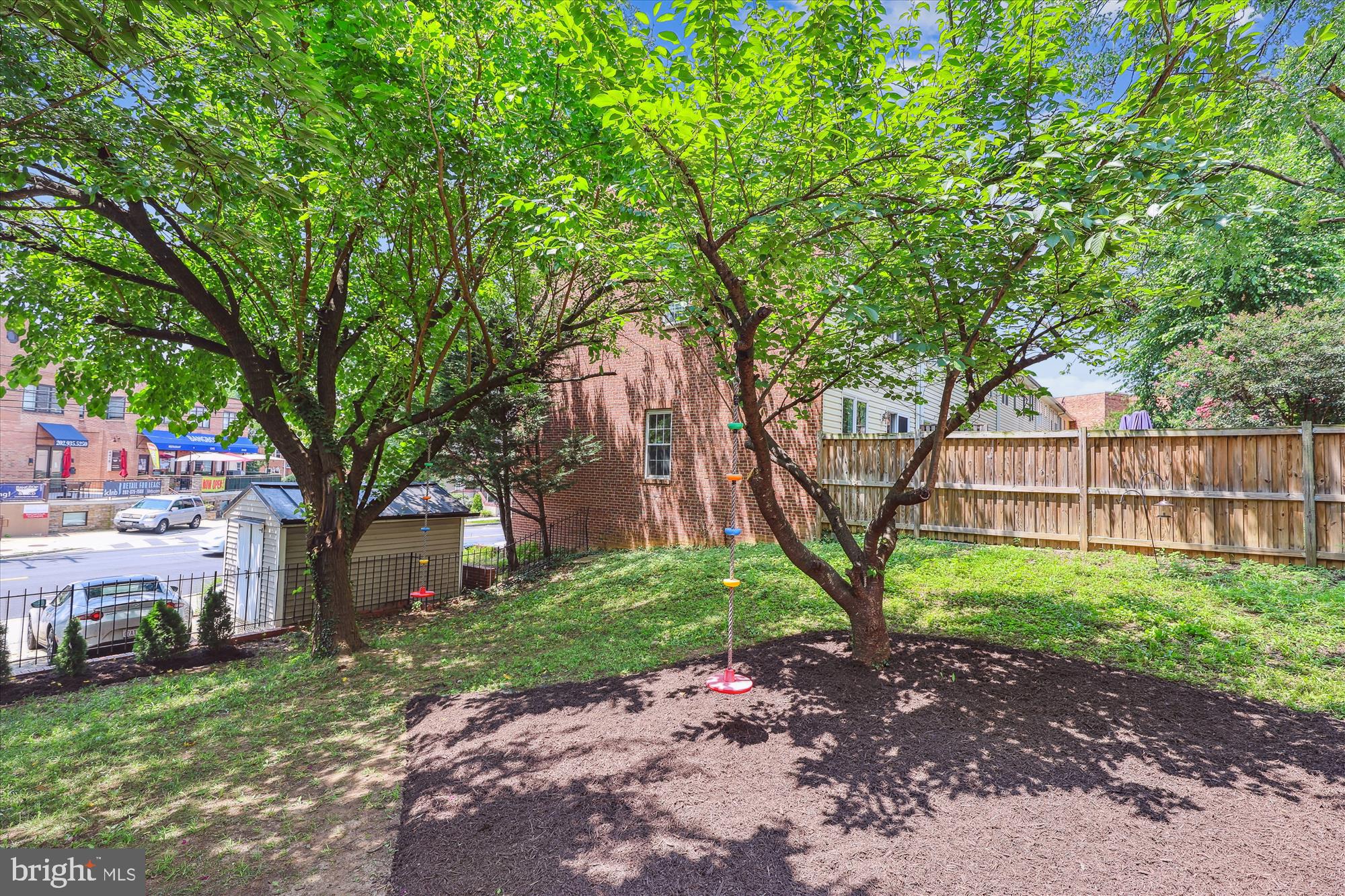 1406 Foxhall Road Northwest Washington, DC 20007 - Photo 30 of 41 a view of a yard in front of a house