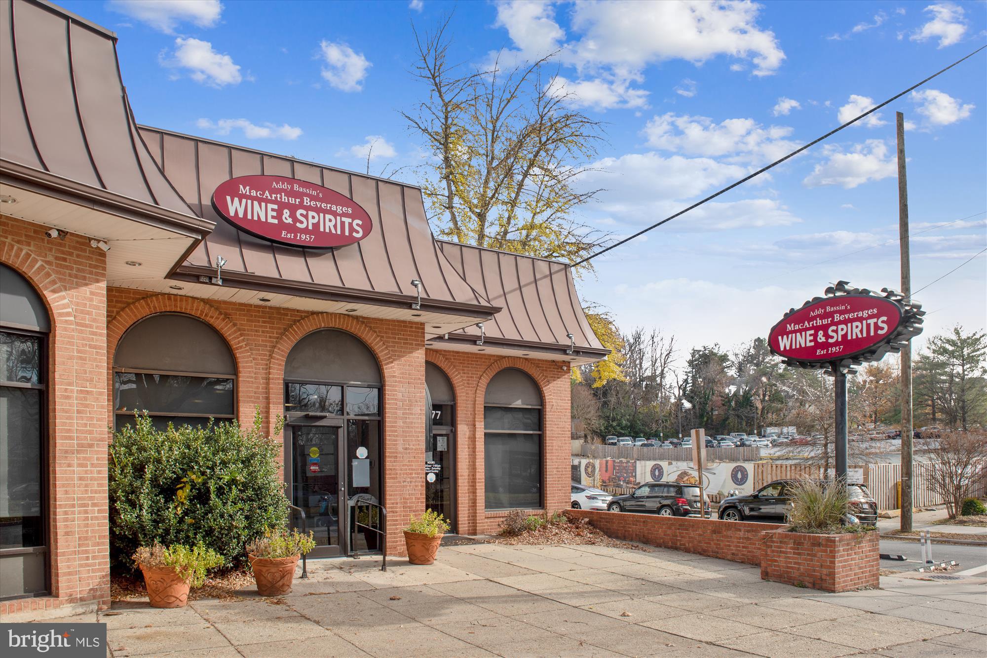 1406 Foxhall Road Northwest Washington, DC 20007 - Photo 36 of 41 a view of a building with a tree