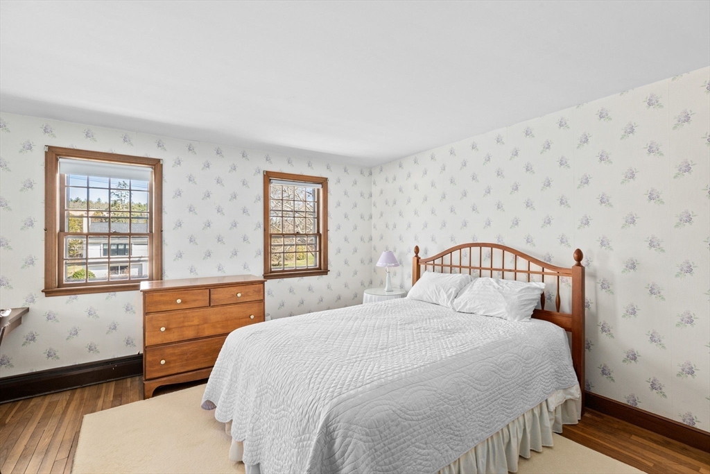 12 Pine Grove Road Hingham, MA 02043 - Photo 16 of 32 a bedroom with a bed and a window