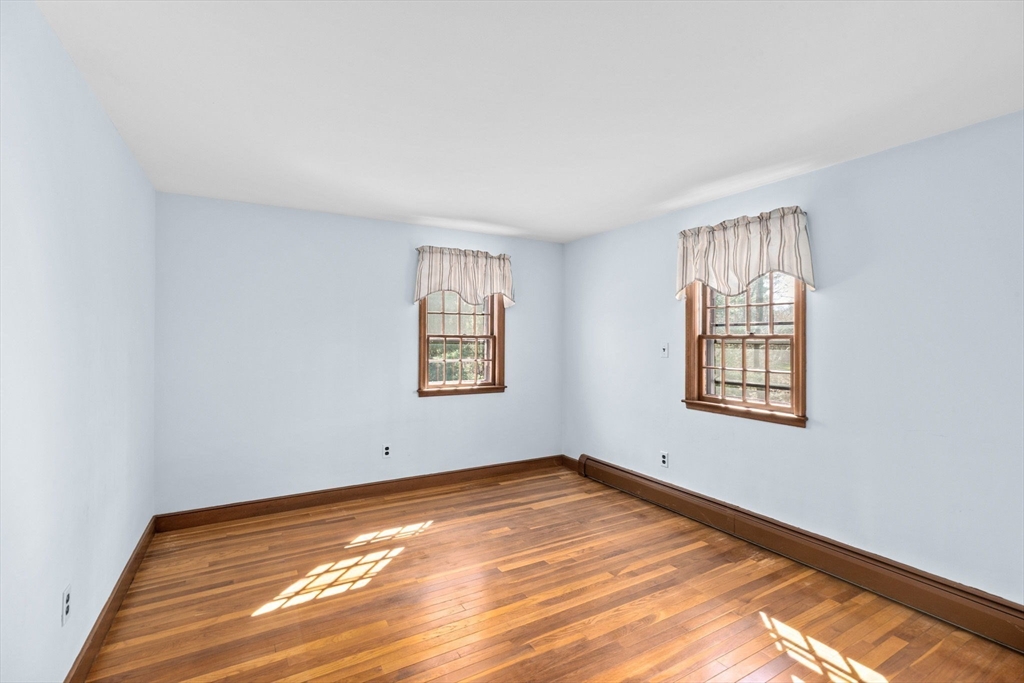 12 Pine Grove Road Hingham, MA 02043 - Photo 21 of 32 an empty room with a window