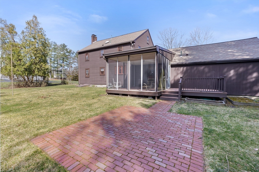 12 Pine Grove Road Hingham, MA 02043 - Photo 28 of 32 a view of a house with a yard