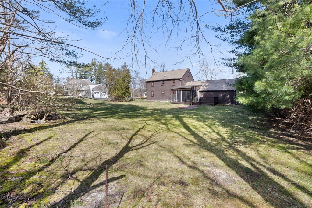 12 Pine Grove Road Hingham, MA 02043 - Photo 30 of 32 a view of a house with a yard