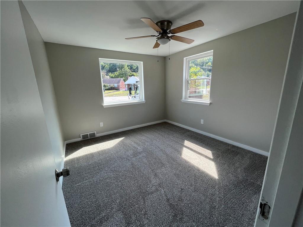 500 Scene Ridge Road McKeesport, PA 15133 - Photo 13 of 26 a view of an empty room with a window