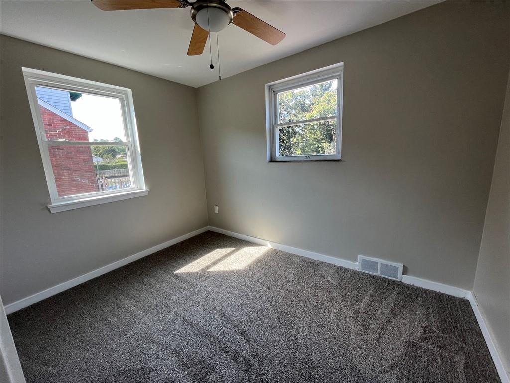 500 Scene Ridge Road McKeesport, PA 15133 - Photo 14 of 26 a view of an empty room with a window