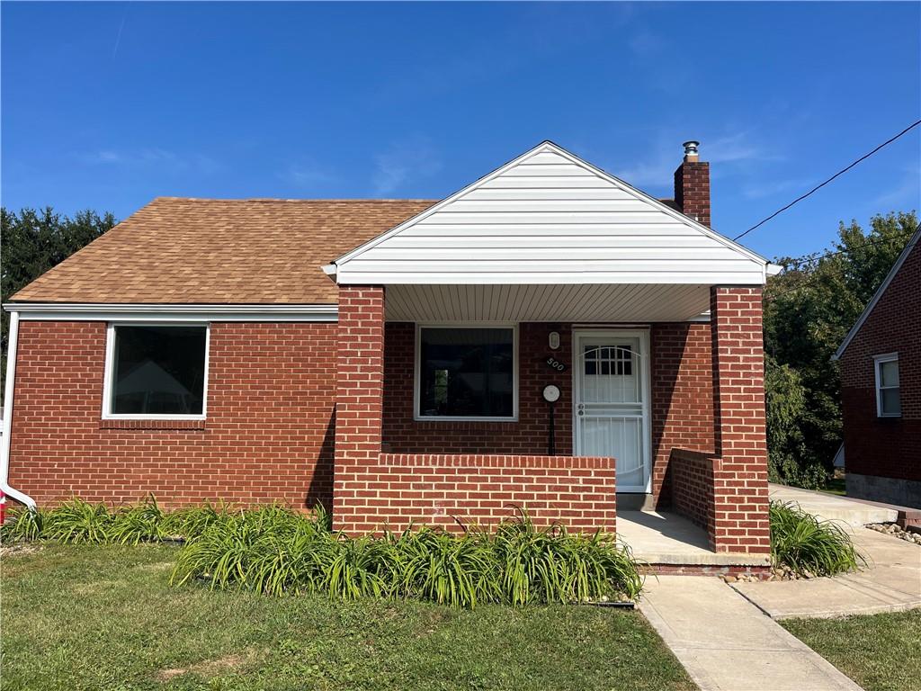 500 Scene Ridge Road McKeesport, PA 15133 - Photo 2 of 26 a front view of a house with garden